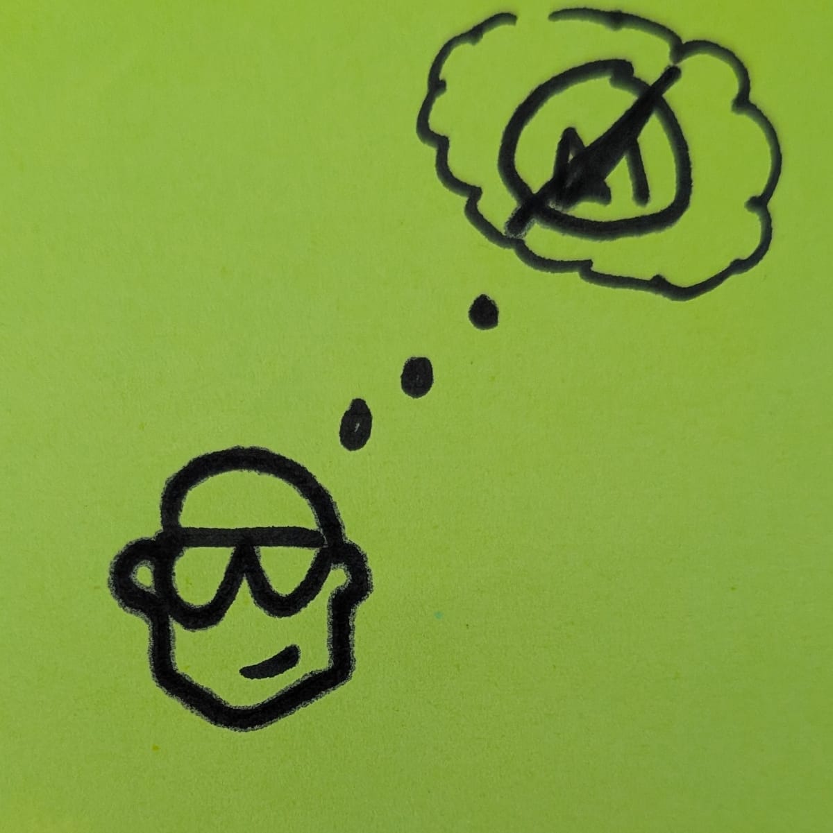 Cartoon self-portrait with a thought bubble containing a 'No AI' sign.