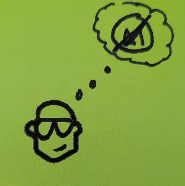 Cartoon self-portrait with a thought bubble containing a 'No AI' sign.